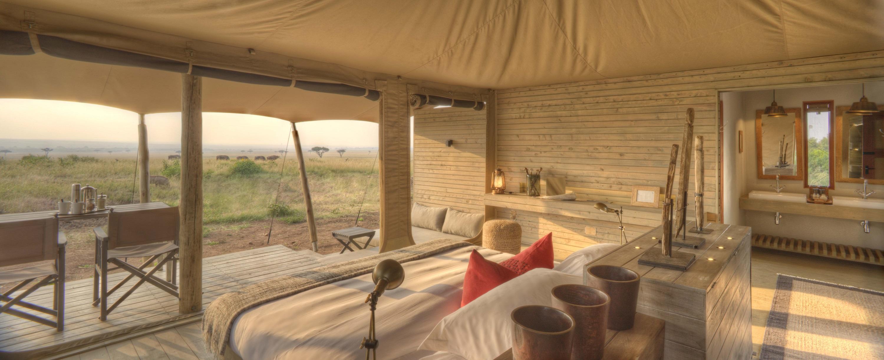 superior view bedroom of suite at andBeyond Kichwa Tembo Camp Kenya Masai Mara