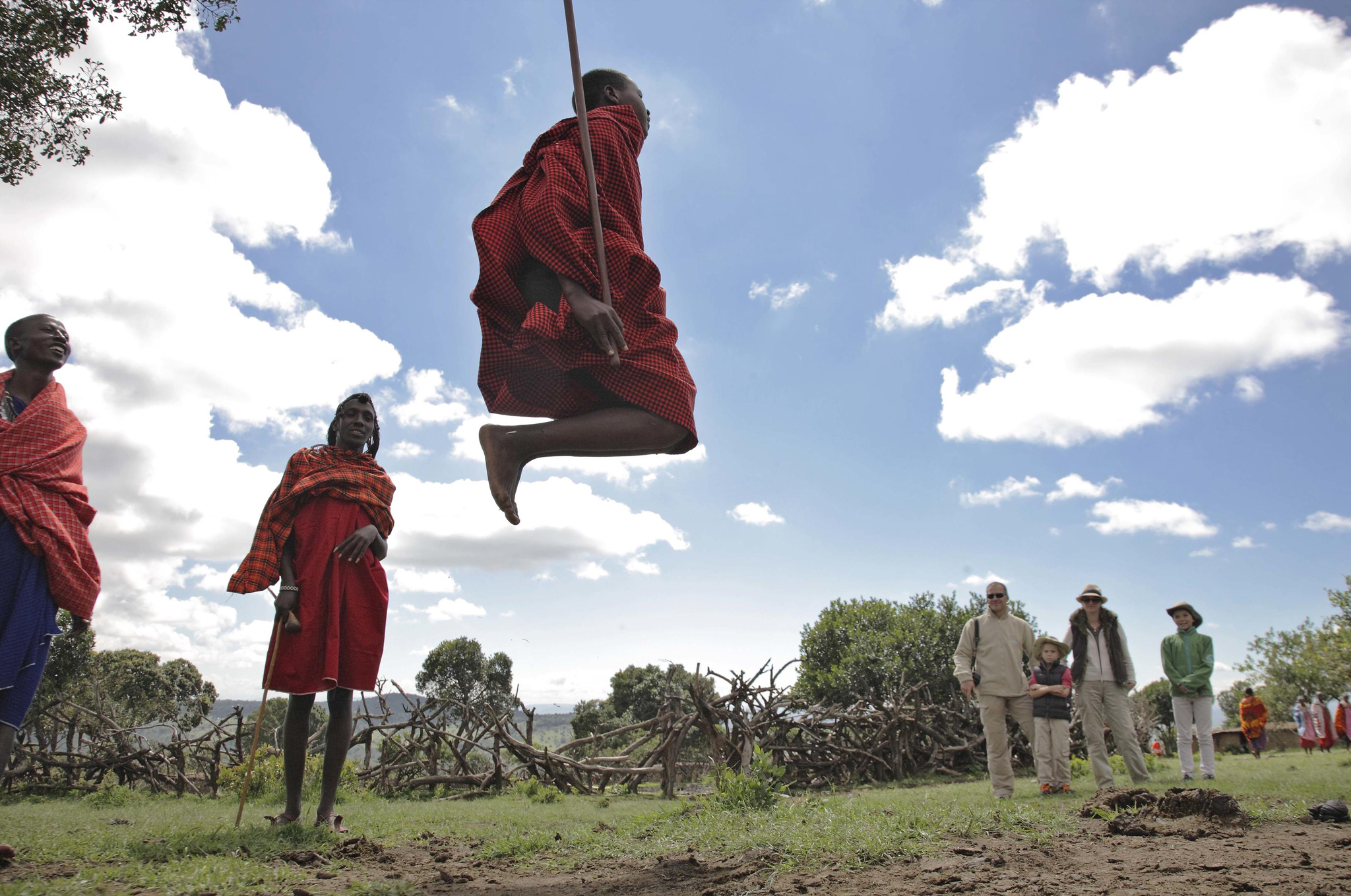 jumping Masai men at andBeyond Kichwa Tembo Camp Kenya Masai Mara