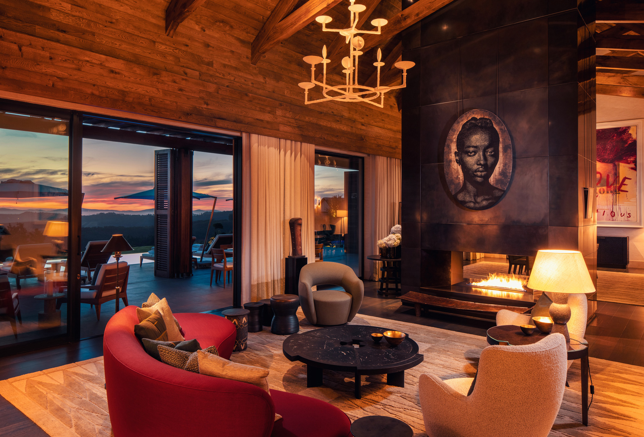 main lounge area with luxury couches and artwork in lounge at Delaire Graff luxury Wine estate in Franshoek