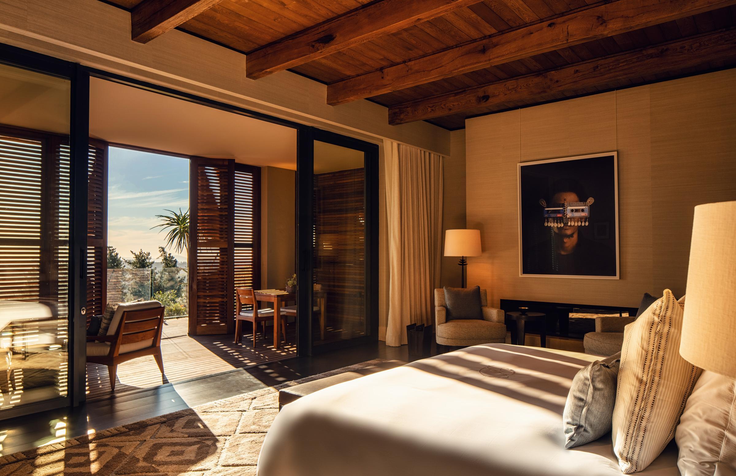 luxury owners villa room interior with patio and views in background by delaire graff wine estate