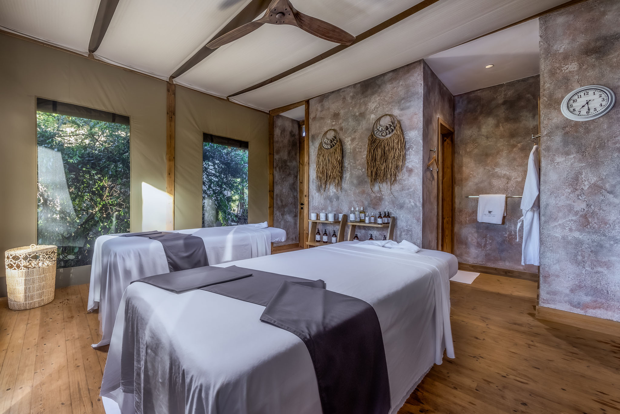 message room with beds inside the spa of the JW Marriot Masai Mara Kenya