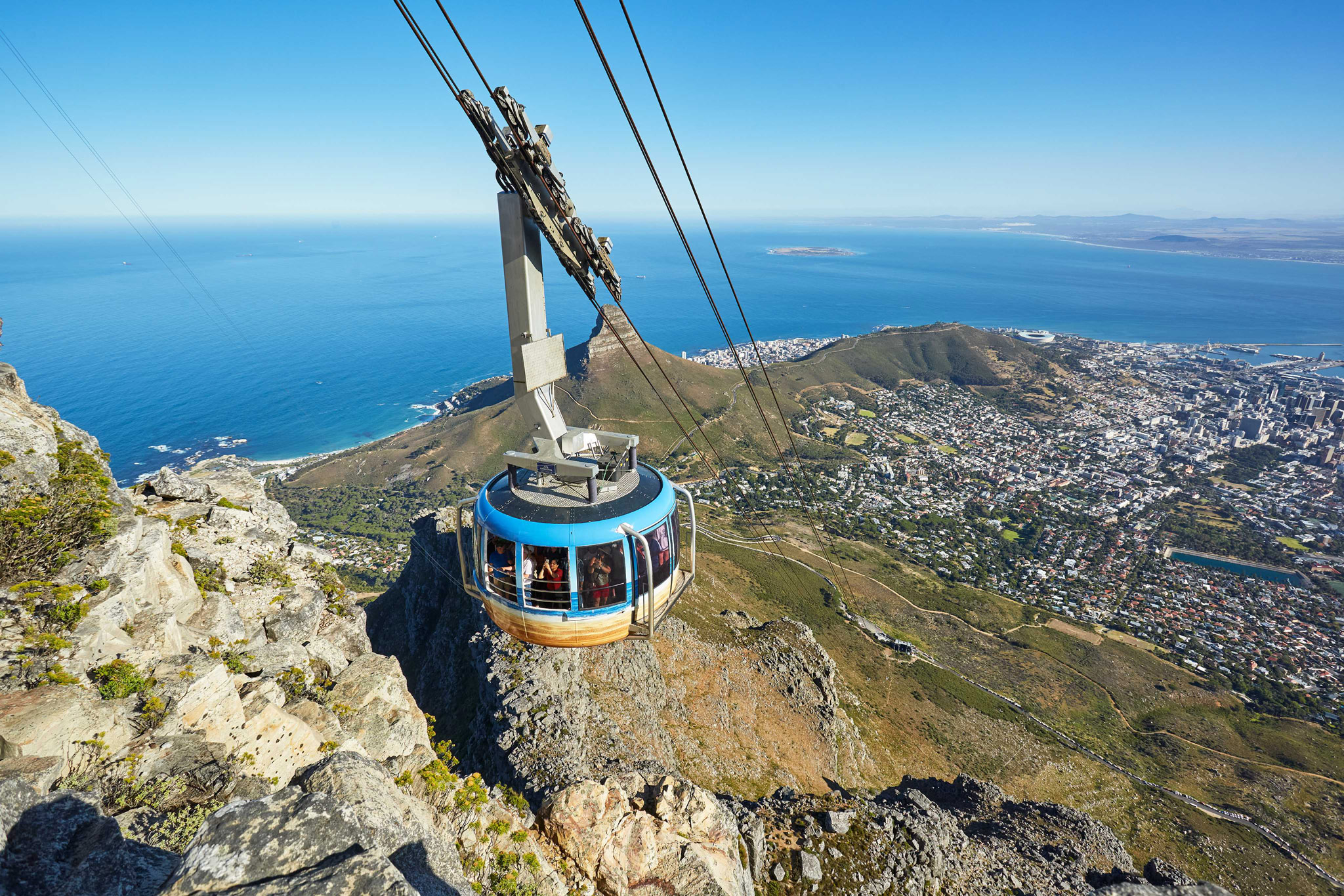 view of a cable cart descending from table mountain cape town