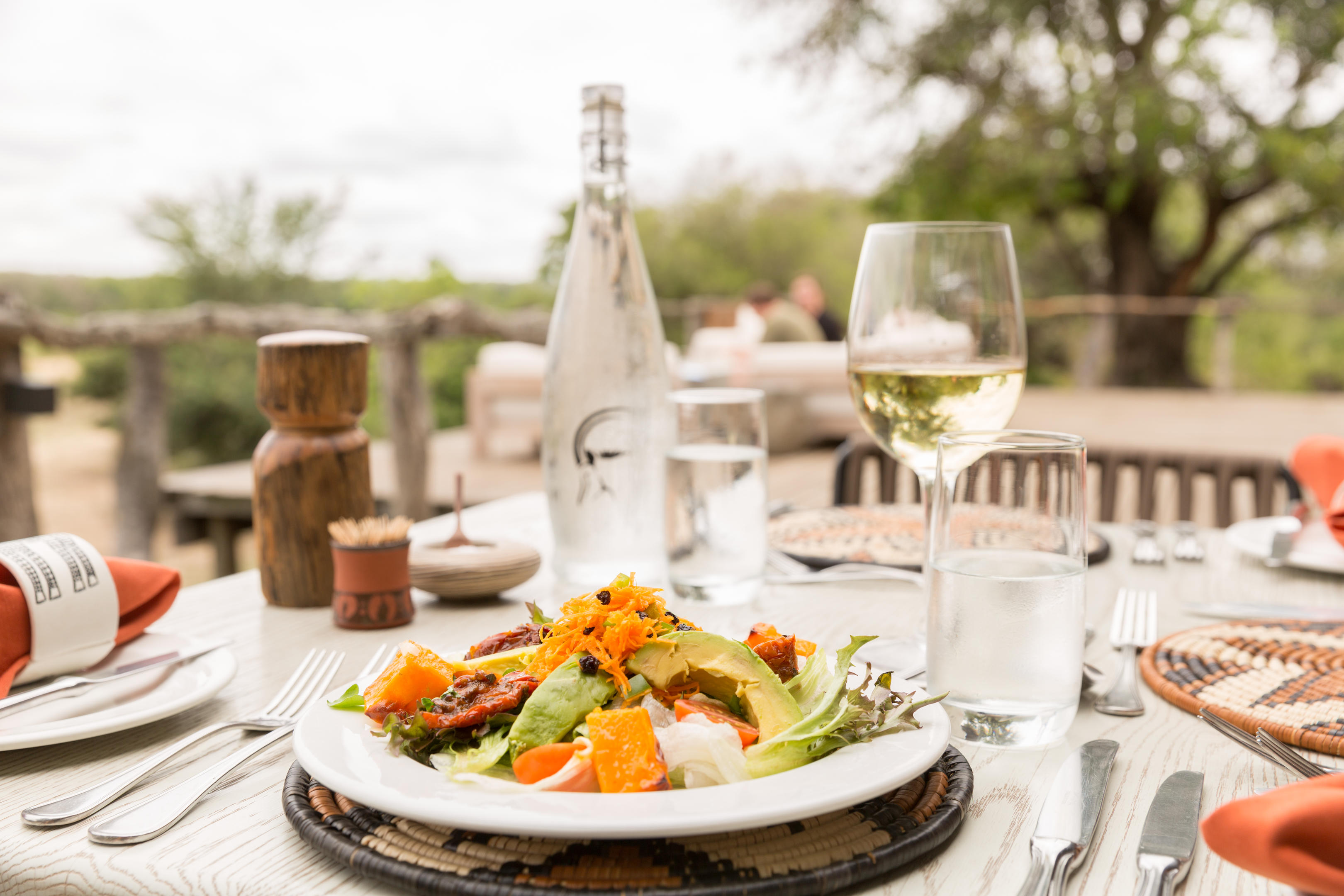 food plates on table by sable camp malamala game reserve