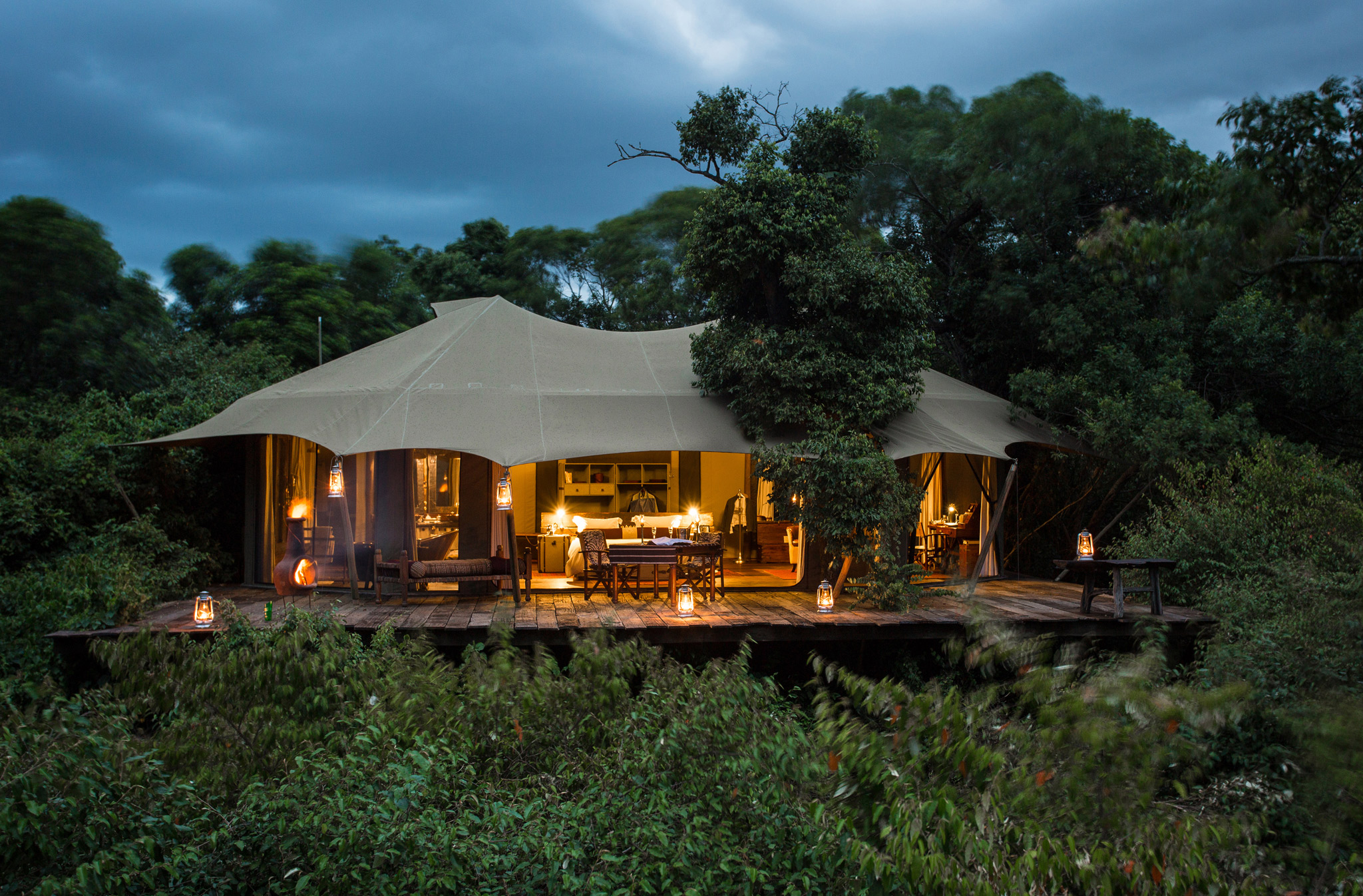 exterior  view of a tented suite at sunset by Mara Plains Camp Kenya Masai Mara