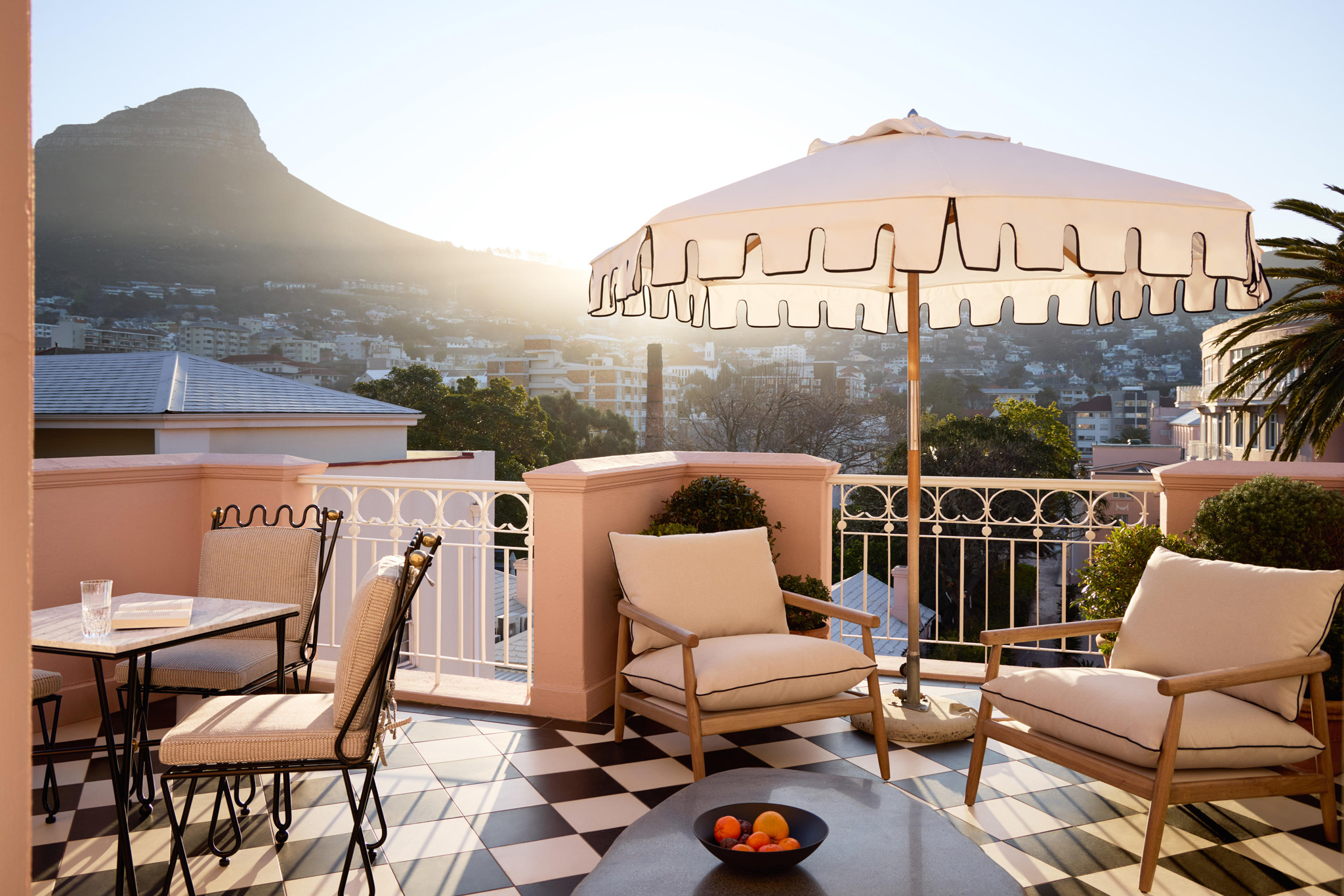 chairs on balcony of luxury suite at Mount Nelson Hotel Cape Town with views of table mountain