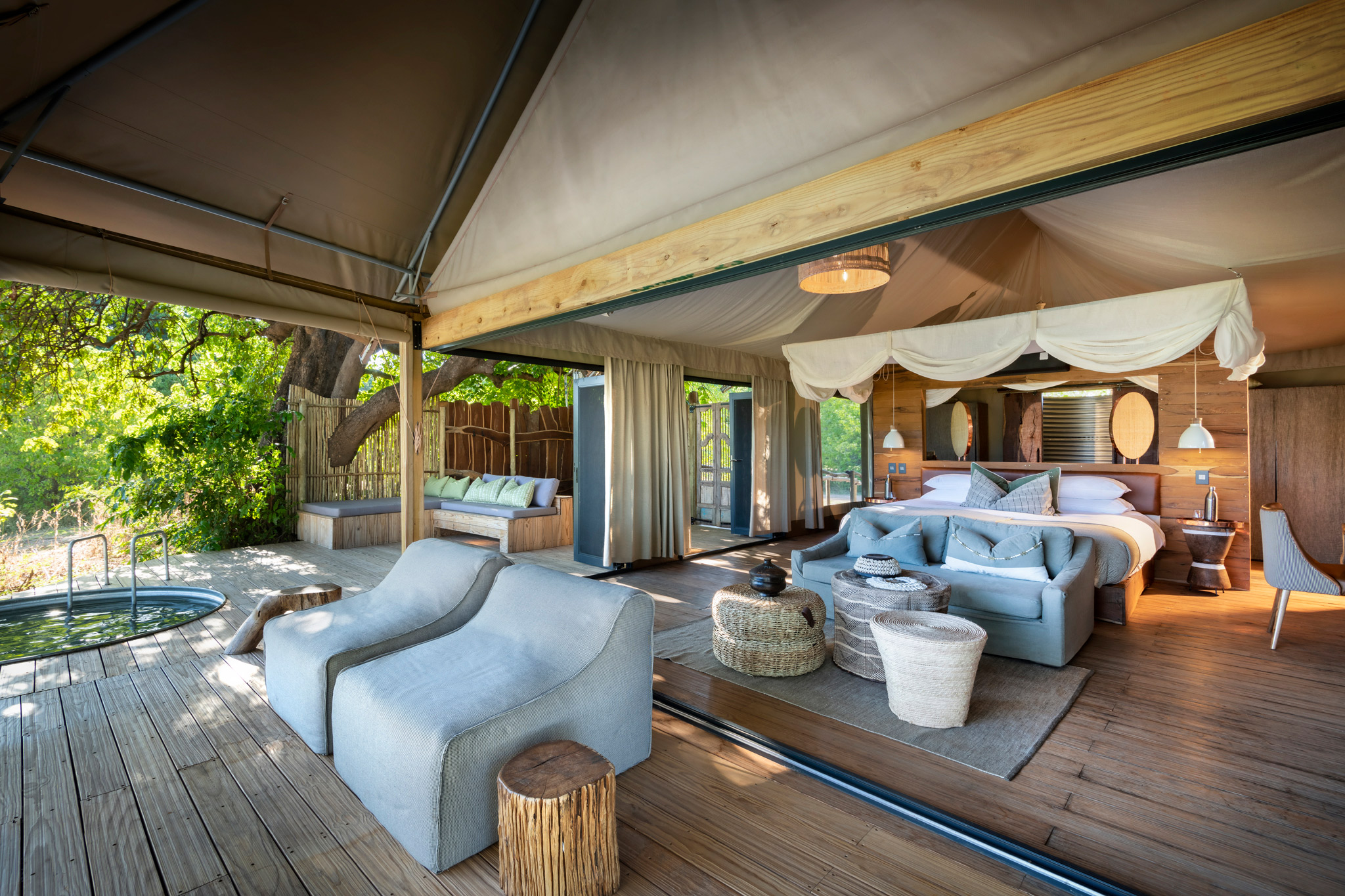 bedroom and deck of a family suite bedroom at Mahogany Nyamatusi Camp Mana Pools Zimbabwe 