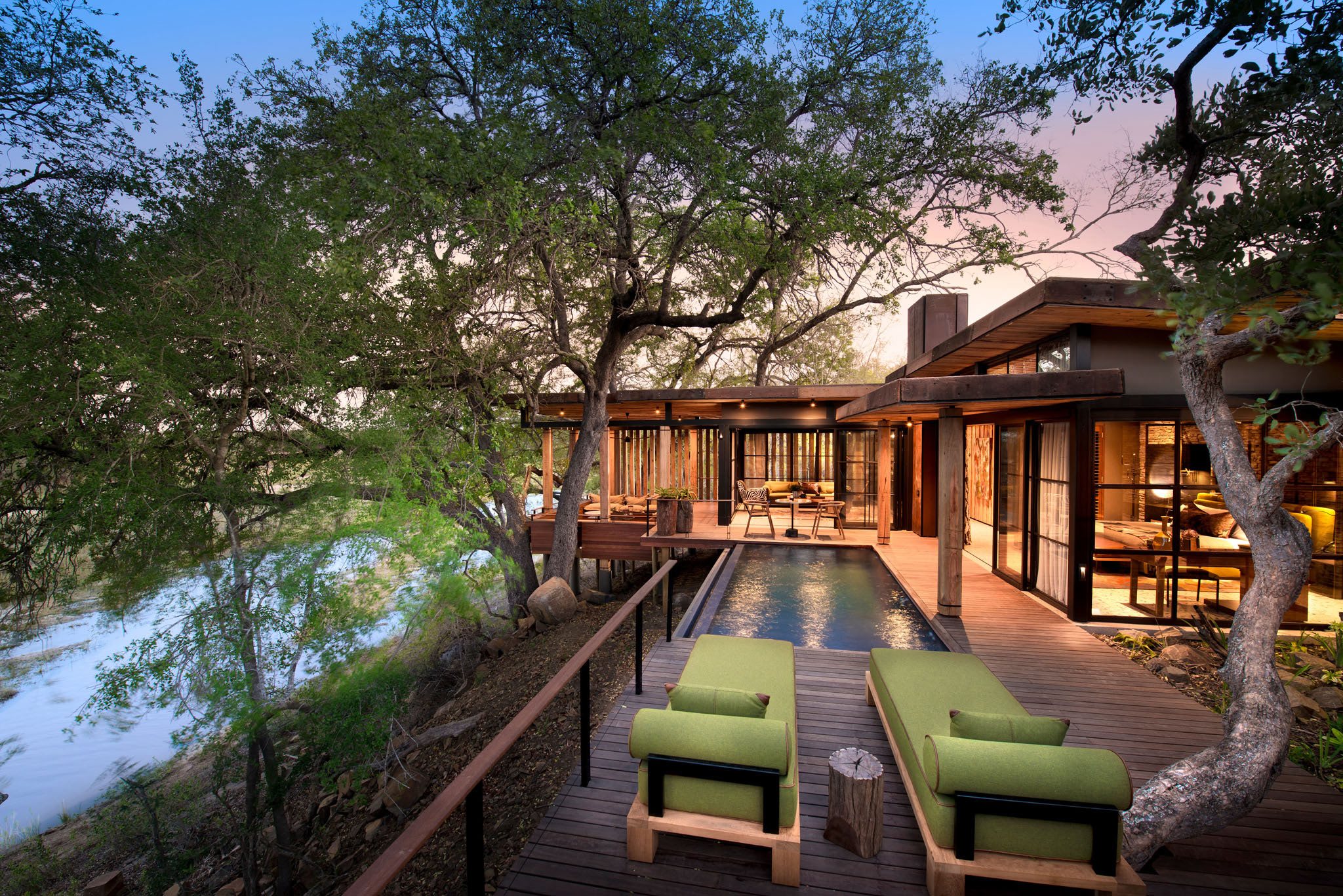 main lodge deck at sunset by andBeyond tengile river lodge