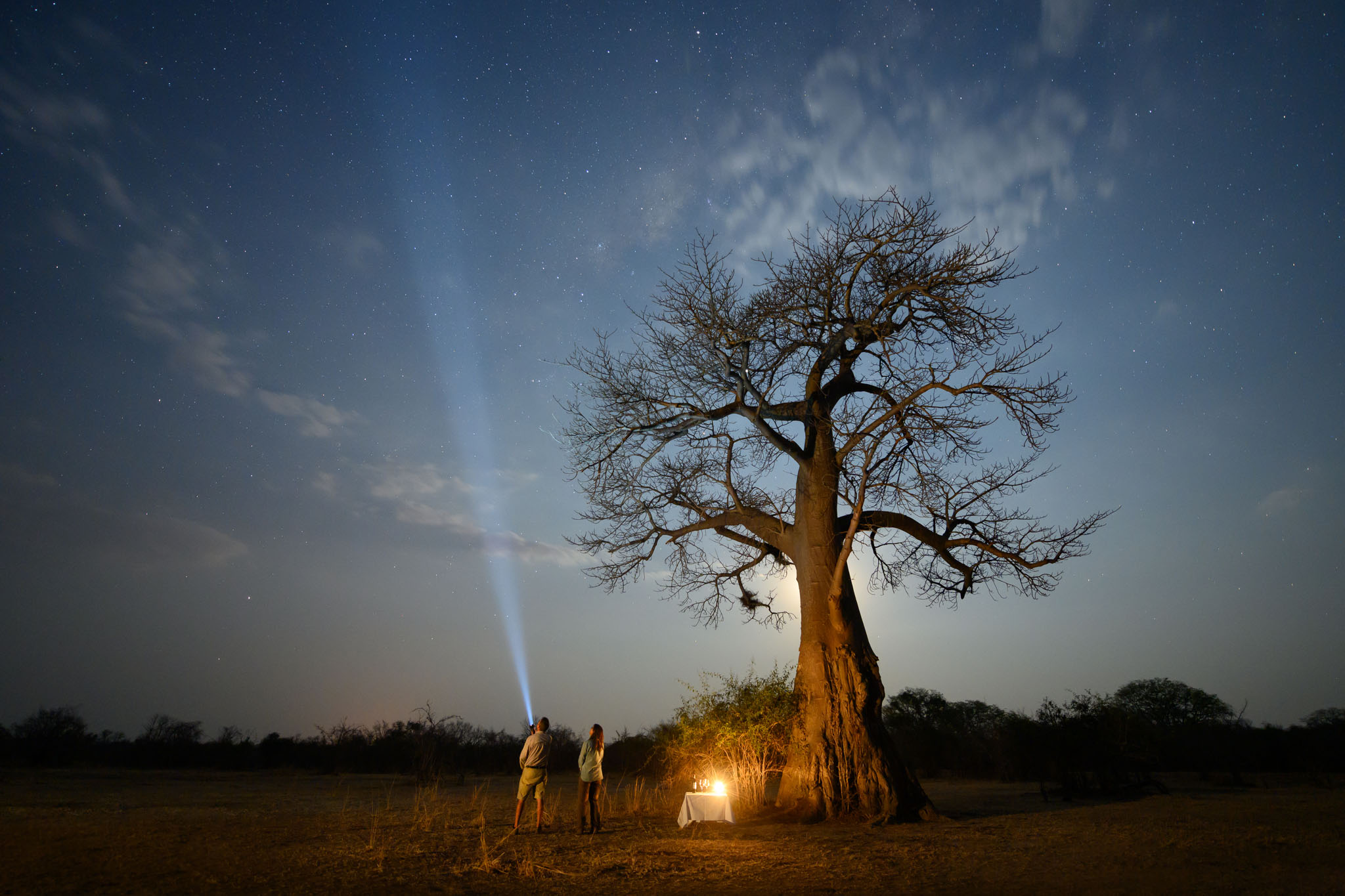 guests shining torches stargazing at Puku Ridge Camp Zambia Luangwa Plains