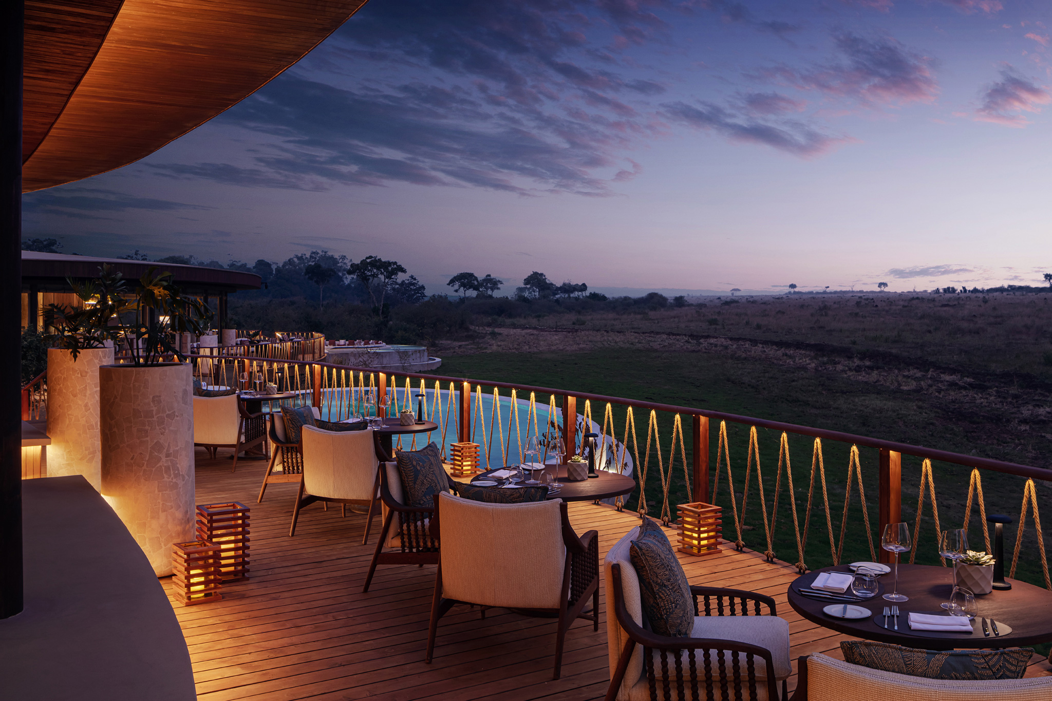 tables set on viewing deck for supper at ritz carlton masai mara