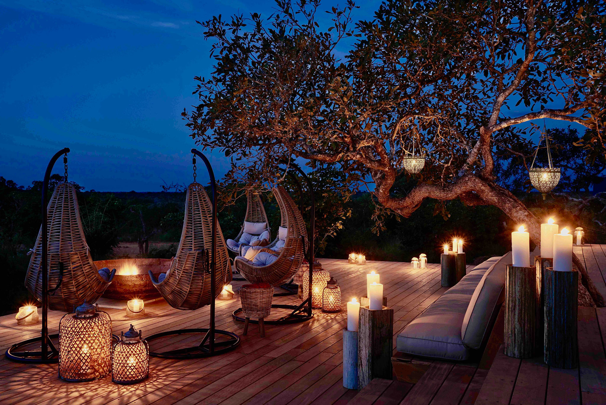 dinner setting on deck of royal malewane at night