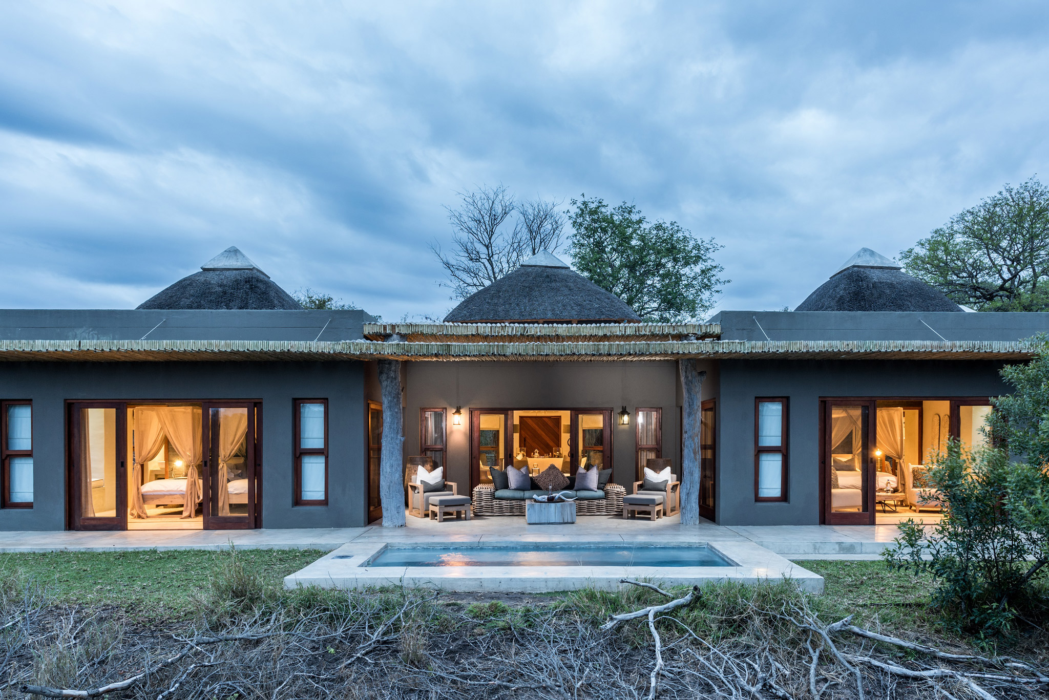 view of sabi sabi bush lodge at sunset from the outside