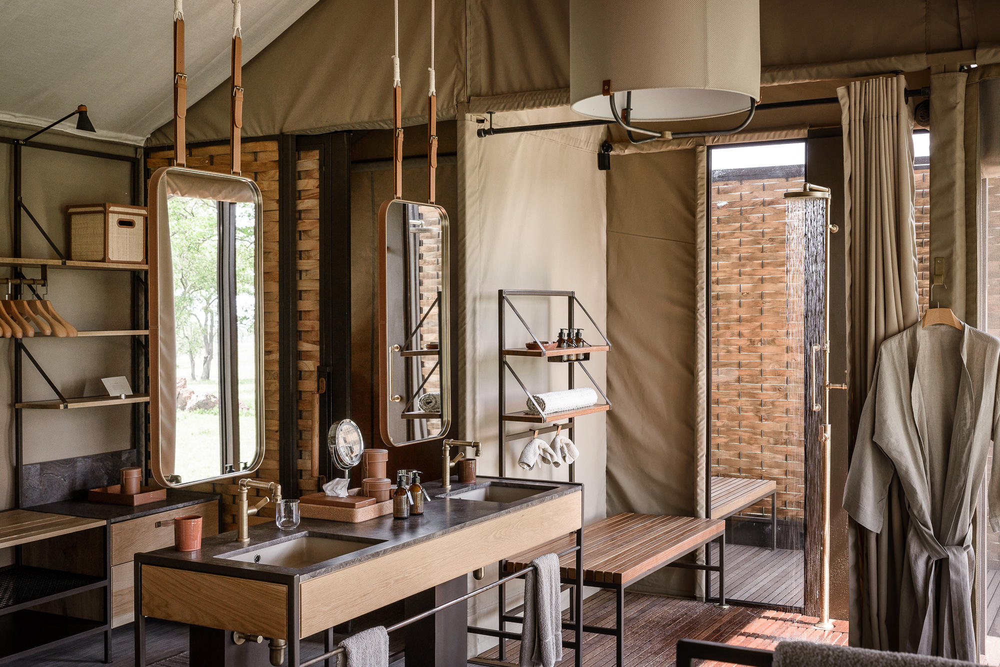 vanity in the bathroom of a tented suite by Singita Sabora Tented Camp Serengeti 