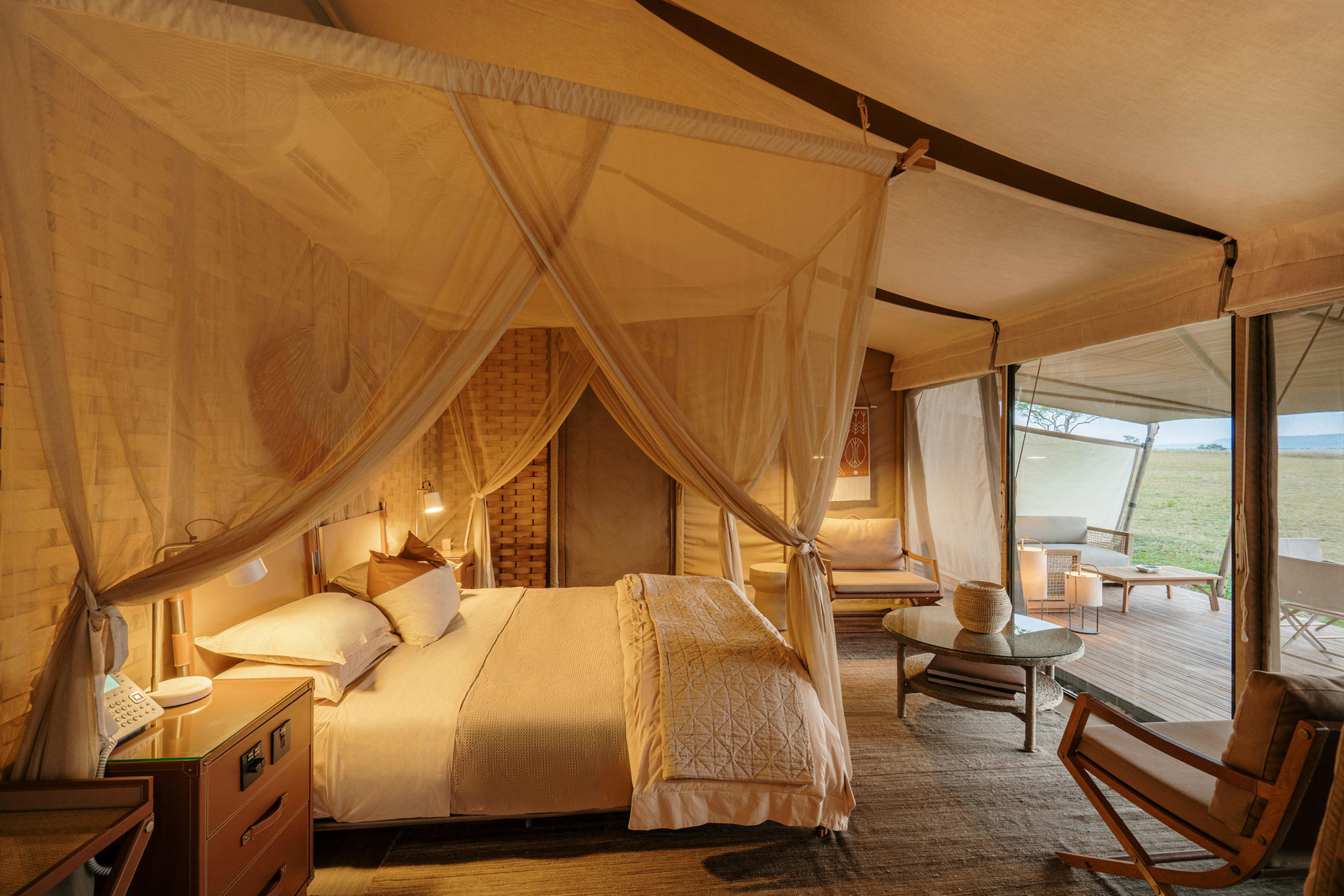 bedroom interior view of a suite at Singita Sabora Tented Camp Serengeti 