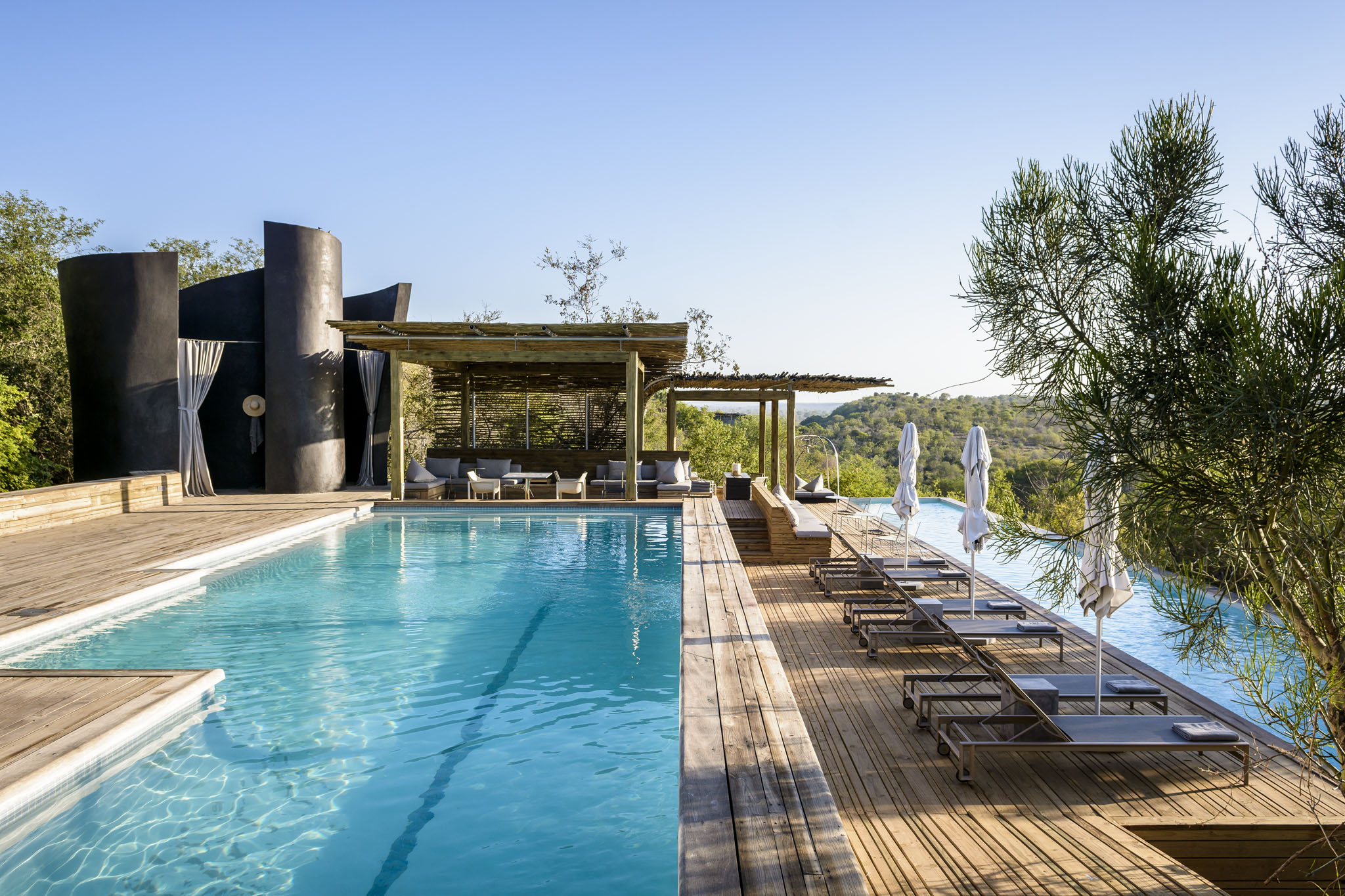 swimming pool and deck of singita lebombo lodge