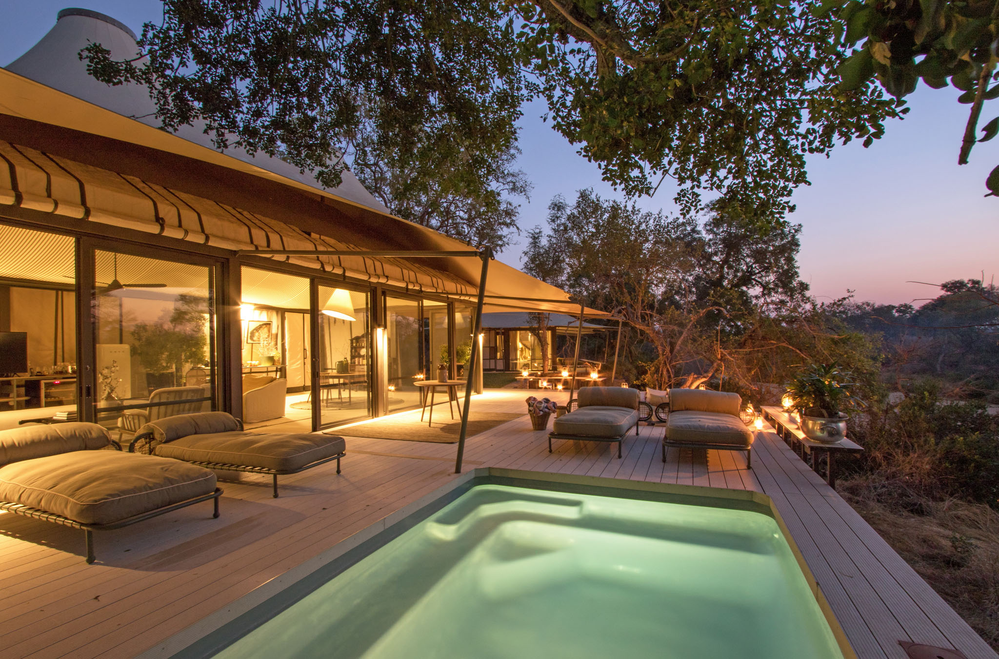 pool and deck view by suite of little saseka Thornybush at night