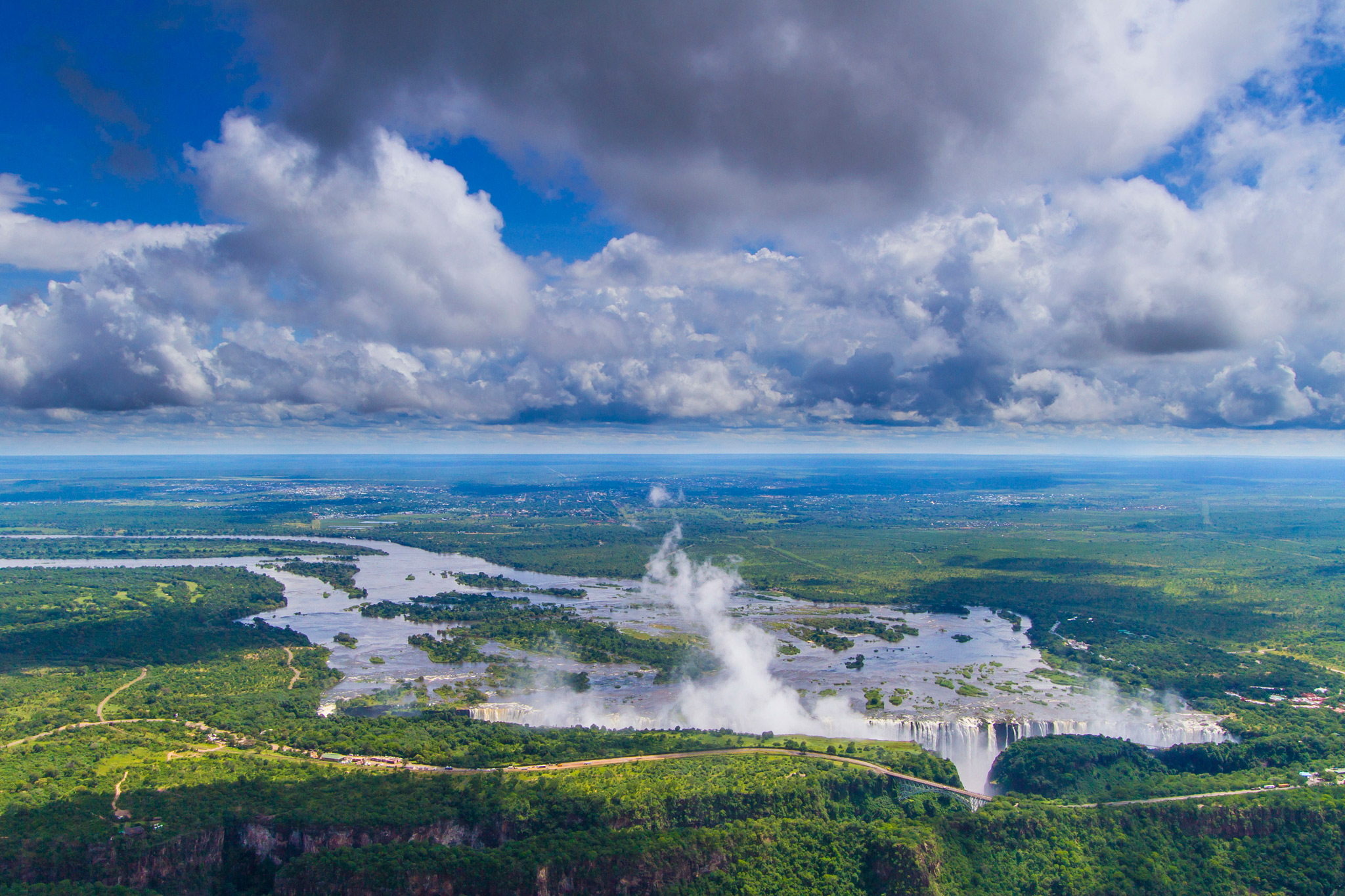 ariel view of entire width of Victoria falls Zimbabwe in full flow
