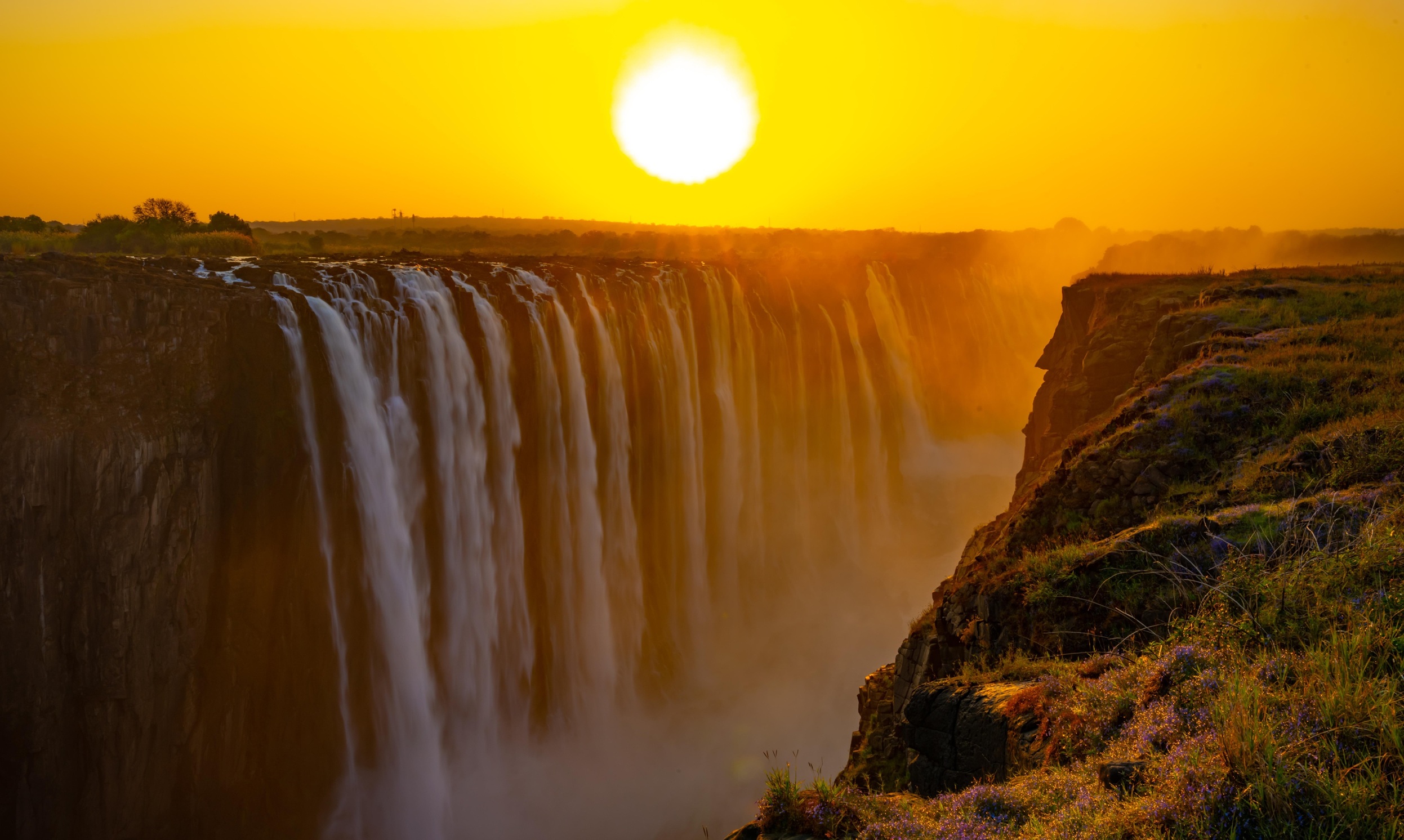 sunset frontal view of Victoria falls Zimbabwe