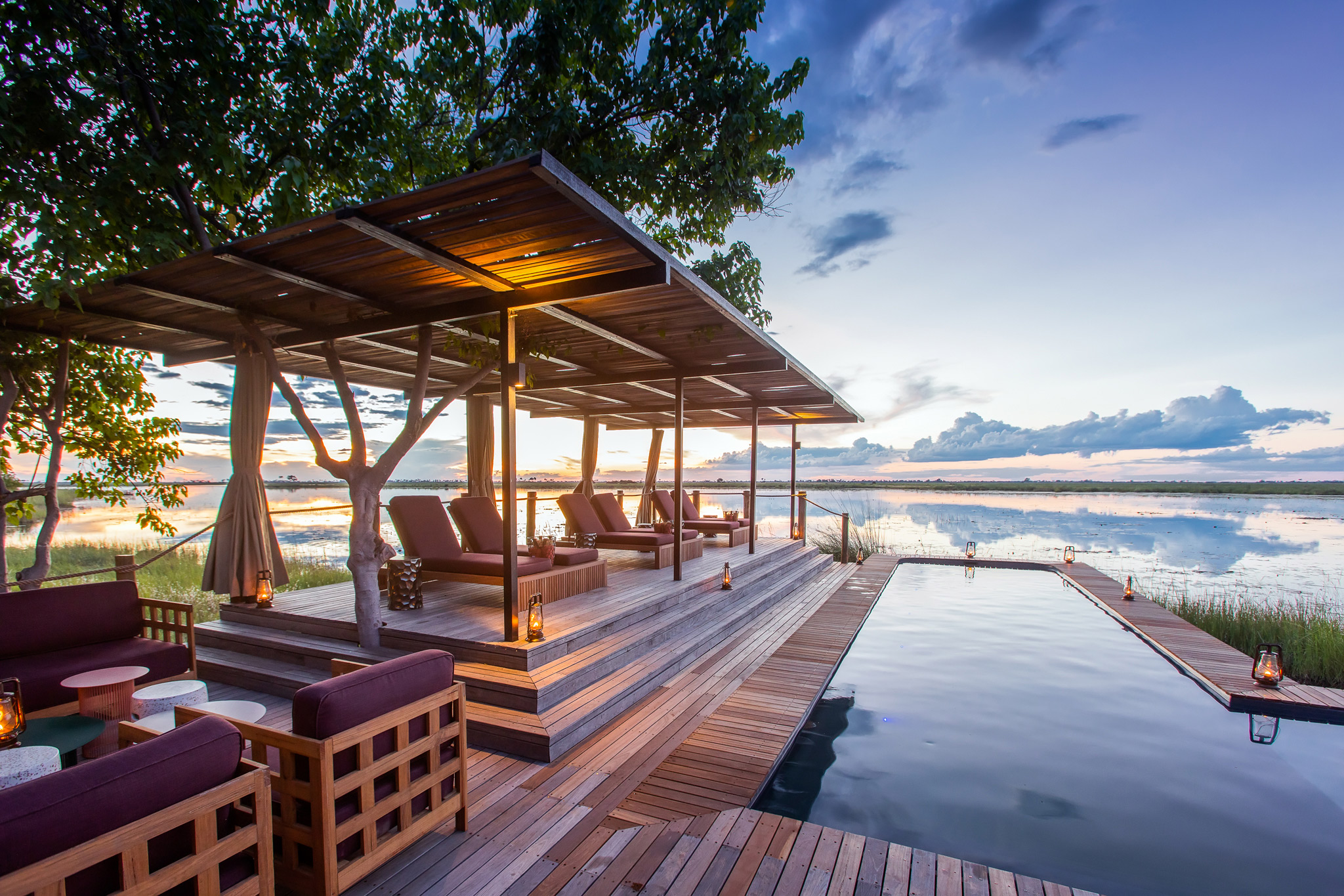 view of the pool and deck at osprey retreat of wilderness duma tau camp botswana