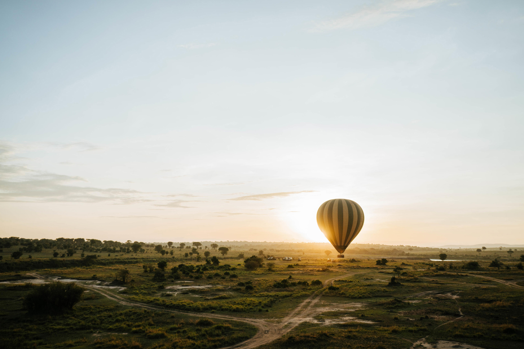 hot air balloon over the Mara at sunrise by Angama Mara Kenya Masai Mara