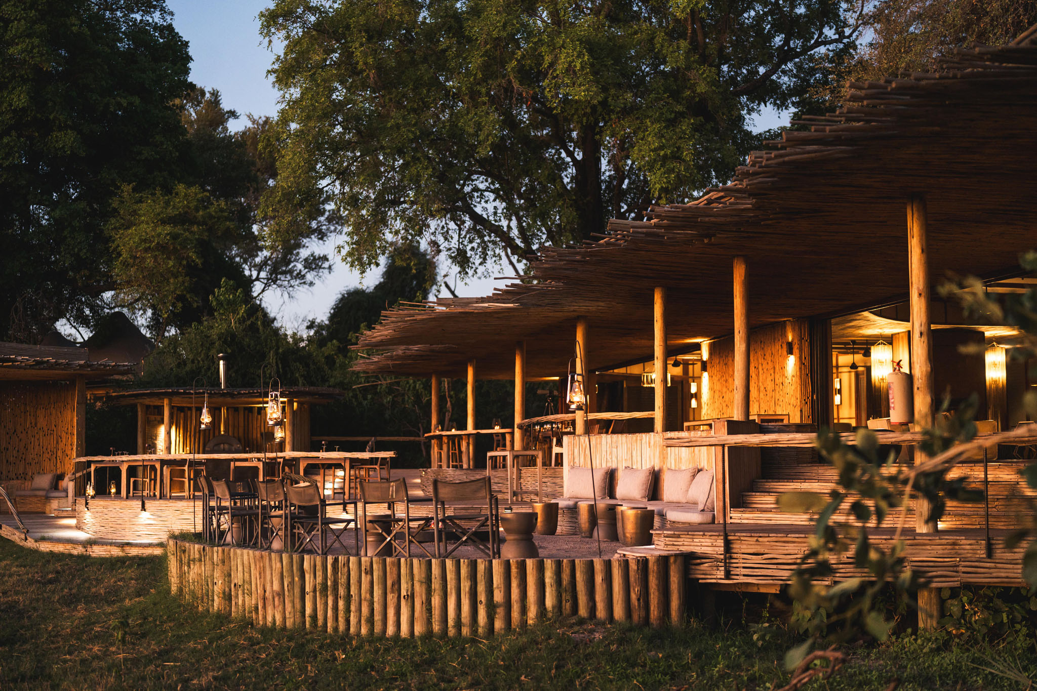 outside view of lodge at sunset at Mombo Camp Wilderness Okavango Delta